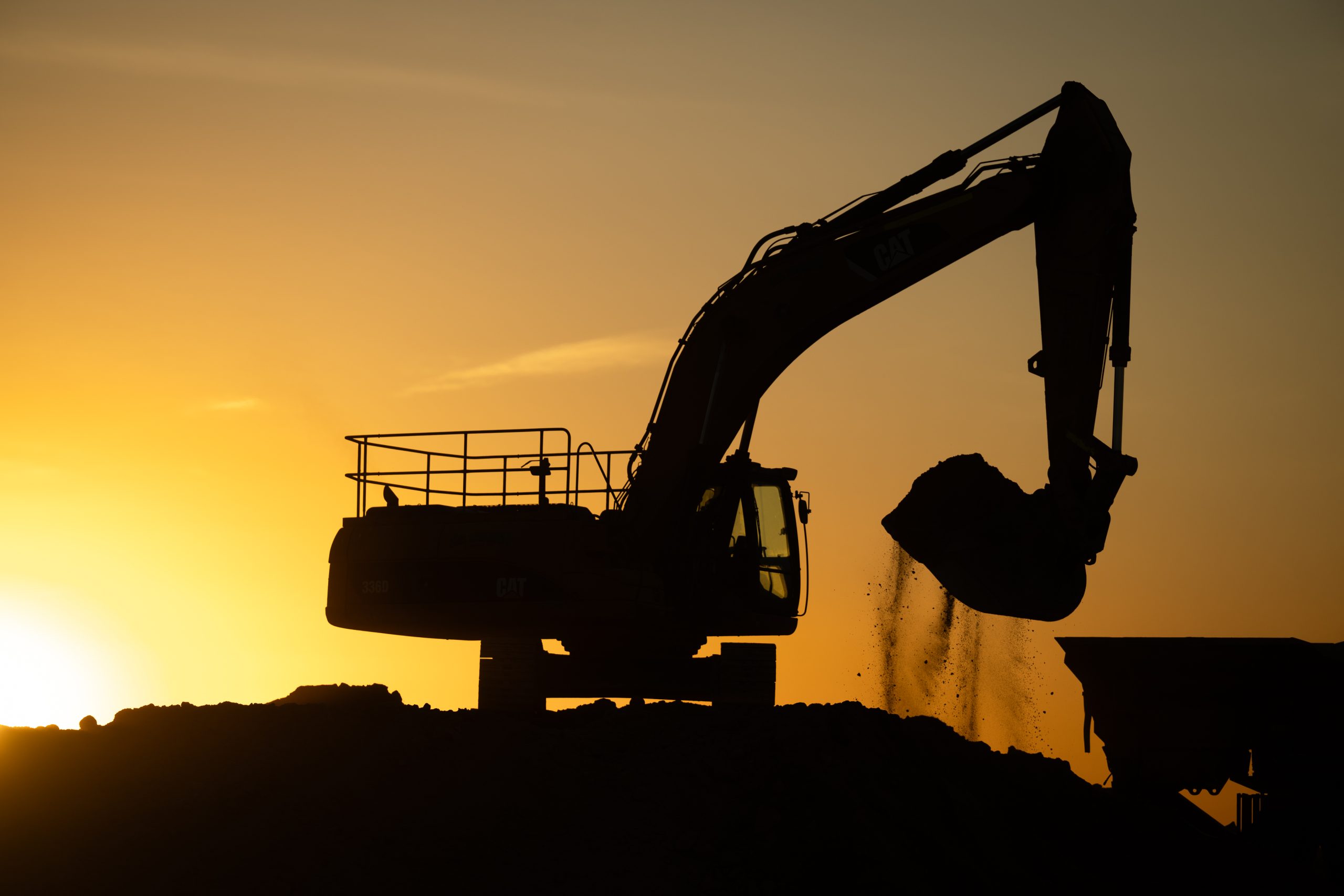 Silhouette of an excavator